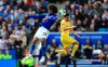 Leicester City's Hamza Choudhury, left, and Chelsea's Pedro battle for the ball in the air during their English Premier League soccer match at the King Power Stadium, Leicester, England, Sunday, May 12, 2019. (Mike Egerton/PA via AP)