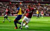 West Ham United's Marko Arnautovic, right, and Southampton's Mario Lemina battle for the ball during their English Premier League soccer match at London Stadium in London, Saturday, May 4, 2019. (Victoria Jones/PA via AP)