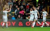 Wolverhampton Wanderers' Raul Jimenez, third right, celebrates scoring his side's first goal of the game during their English Premier League soccer match against Watford at Vicarage Road, Watford, England, Saturday, April 27, 2019. (Nigel French/PA via AP)