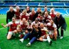 Arsenal players celebrate winning the FA Women's Super League at full time, at the AMEX Stadium, Brighton, England, Sunday, April 28, 2019. Arsenal Women became English champion for the first time since 2012 on Sunday. The team beat Brighton 4-0 in front of a record crowd of 5,265 fans at the Amex Stadium to clinch the Women's Super League title. (Mark Kerton/PA via AP)