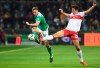 Werder's Niklas Moisander, left, battles against Stuttgart's Mario Gomez for the ball during the German Bundesliga soccer match between Werder Bremen and VfB Stuttgart in Bremen, Germany, Friday, Feb. 22, 2019. (Carmen Jaspersen/dpa via AP)