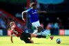 Bournemouth's Steve Cook, left, and Everton's Moise Kean battle for the ball during the English Premier League soccer match between Bournemouth and Everton at The Vitality Stadium, Bournemouth, England, Sunday, Sept. 15, 2019. (Adam Davy/PA via AP)