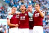 Burnley's Jeff Hendrick, second left, celebrates scoring his side's first goal of the game during their English Premier League soccer match against Brighton & Hove Albion at The AMEX Stadium, Brighton, England, Saturday, Sept. 14, 2019. (Gareth Fuller/PA via AP)