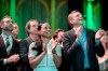 Swedish Green Party (Miljoepartiet) candidate Alice Bah Kuhnke, center, and Per Bolund, right, Minister for Financial Markets and Housing, applaud at the party's election night watch party as first preliminary results in the European Parliament elections are presented, at Clarion Hotell in Stockholm, Sweden, Sunday, May 26, 2019. (Janerik Henriksson/TT News Agency via AP)