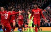 Liverpool's Divock Origi, right, celebrates scoring his side's fourth goal of the game during the Champions League Semi Final, second leg soccer match between Liverpool and Barcelona at Anfield, Liverpool, England, Tuesday, May 7, 2019. (Peter Byrne/PA via AP)