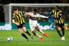 Watford's Craig Cathcart, left, and Abdoulaye Doucoure, right, battle for the ball with Fulham's Ryan Sessegnon during their English Premier League soccer match at Vicarage Road, Watford, England, Tuesday, April 2, 2019. (Nigel French/PA via AP)