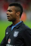 England substitute Ashley Cole is seen during the warm-up before their World Cup Group H qualifying soccer match against San Marino at Wembley Stadium in London, Friday Oct. 12, 2012. (AP Photo/Tom Hevezi)