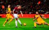 West Ham United's Marko Arnautovic scores his side's first goal against Brighton & Hove Albion during a Premier League soccer match at the London Stadium, Wednesday, Jan. 2, 2019, in London. (Victoria Jones/PA via AP)/PA via AP)