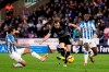 Burnley's Ashley Barnes, center, scores his side's second goal of the game against Huddersfield during a Premier League soccer match at John Smith's Stadium, Wednesday, Jan. 2, 2019, in Huddersfield, England. (Martin Rickett/PA via AP)/PA via AP)
