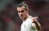 FILE - In this Saturday, Sept. 28, 2019 file photo, Real Madrid's Gareth Bale gestures during the Spanish La Liga soccer match between Atletico Madrid and Real Madrid at the Wanda Metropolitano stadium in Madrid. The immediate future of Gareth Bale is once again in doubt after he travelled to London with permission of Real Madrid to see his agent this week. That reignited speculation about a possible departure after his coach said in July that it would best for player and club to part ways. Zinedine Zidane has since backtracked and said that Bale is an important player for him, but the damage was done to the public image of their relationship. (AP Photo/Bernat Armangue, File)