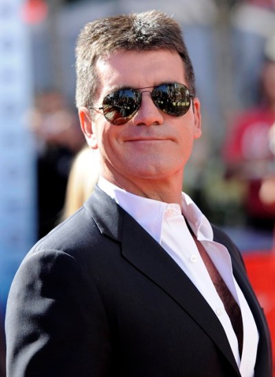 FILE - In this Wednesday, May 26, 2010 file photo British entertainment mogul Simon Cowell arrives at the 