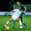 FILE - In this Thursday, Feb. 28, 2019 file photo, France forward Marie-Antoinette Katoto challenges for the ball with Germany midfielder Sara Dabritz during a women's international friendly soccer match between France and Germany at Francis-le-Basser stadium in Laval, western France. Coach Corinne Diacre has defended her decision to leave out Paris Saint-Germain striker Marie-Antoinette Katoto from France Women's World Cup squad. France will host the tournament from June 7, 2019 to July 7, 2019. (AP Photo/David Vincent, File)