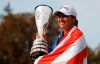 FILE - In this Sunday, Sept. 16, 2018 file photo, Angela Stanford of the U.S. poses with her trophy after winning the Evian Championship women's golf tournament in Evian, eastern France. The Evian Championship begins back-to-back majors weeks in women’s golf for the first time in six decades on Thursday July 24, 2019. The $4.1 million tournament has been restored to July in the calendar from its previous rain-hit slot in September. (AP Photo/Francois Mori, File)
