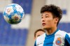 FILE - In this Tuesday, Jan. 29, 2019 file photo, newly signed Espanyol soccer player Wu Lei eyes the ball during his official presentation at RCDE stadium in Cornella Llobregat, Spain. When Barcelona takes on city rival Espanyol on Saturday March 30, 2019, the Catalan derby will feature Lionel Messi, the Argentina star the world is used to watching, and the Wu Lei, the Chinese sensation that China is starting to fall in love with. (AP Photo/Manu Fernandez, File)