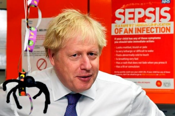 Toby Melville / Pool / The Associated PressBritain's Prime Minister Boris Johnson speaks to staff in the children's ward as he visits Milton Keynes University Hospital in Milton Keynes, England, Friday Oct. 25, 2019. European Union ambassadors agreed Friday that the bloc should grant Britain’s request for another extension to the Brexit deadline but have not yet figured out how long that delay should be. (Toby Melville/Pool via AP)