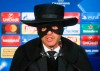 FILE - In this Wednesday, Dec. 6, 2017 file photo, Shakhtar coach Paulo Fonseca, dressed as Zorro, attends a press conference after victory for his team in the Champions League group F soccer match between Manchester City and Shakhtar Donetsk at the Metalist Stadium in Kharkiv, Ukraine. Portuguese coach Fonseca, who won fame for dressing up as Zorro after beating Manchester City in the Champions League in 2017, has won three consecutive league titles in Ukraine with Shakhtar. The club hasn’t been able to return to its home city of Donetsk since 2014 because it’s occupied by Russia-backed separatists. (AP Photo/Efrem Lukatsky, File)
