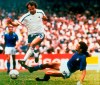 FILE - In this file photo dated June 17, 1986, Michel Platini, left, of France dribbles past Italian forward Alessandro Altobelli in their World Cup eight finals in Mexico City's Azteca Stadium. France won 2-0 to advance to the quarterfinals of the tournament and Italy was eliminated. Affectionately nicknamed “Le Roi” (The King), Michel Platini bestrode the soccer field with inimitable elegance as the world’s best player of the early 1980s, but his lofty reputation seems to have been tainted. (AP Photo, FILE)