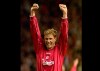 FILE - In this Thursday, April 19, 2001 file photo, Liverpool's Swiss player Stephane Henchoz celebrates after his team defeated Barcelona 1-0 in a UEFA Cup semifinal soccer match in Liverpool. Former Liverpool defender Stephane Henchoz has been appointed coach of Neuchatel Xamax, on Tuesday Feb, 5, 2019, aiming to keep the struggling team in the Swiss top-tier division. (AP Photo/Denis Doyle, File)