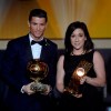 FILE - In this Monday, Jan, 12, 2015 file photo, Cristiano Ronaldo, left, of Portugal, and Nadine Kessler of Germany pose after winning the FIFA soccer player of the year 2014 prize at the FIFA Ballon d'Or awarding ceremony at the Kongresshaus in Zurich, Switzerland. UEFA launched its five-year development plan for women‚Äôs soccer Friday May 17, 2019, in a breakthrough season leading to the World Cup in France. The strategy document, Time for Action, sets out how the European soccer body aims to double the number of women and girls playing, and change perceptions of their game. (Walter Bieri/Keystone via AP, File)