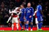 Arsenal's Pierre-Emerick Aubameyang, top left, celebrates scoring his side's first goal of the game from the penalty spot against Cardiff City during their English Premier League soccer match at the Emirates Stadium in London, Tuesday Jan. 29, 2019. (Nick Potts/PA via AP)