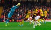 Watford goalkeeper Ben Foster makes a save during the English Premier League soccer match between Watford and Bournemouth at the Vicarage Road Stadium, Watford, England. Saturday, Oct. 26 2019. (Aaron ChownPA via AP)