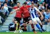 Southampton's Danny Ings, left, Pierre-Emile Hojbjerg, center, and Brighton & Hove Albion's Dale Stephens battle for the ball during the English Premier League soccer match between Brighton and Hove Albion and Southampton at the Amex Stadium, Brighton England. Saturday, March 30, 2019. (Gareth Fuller/PA via AP)