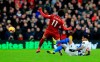 Liverpool's Mohamed Salah, left, and Brighton & Hove Albion's Jurgen Locadia battle for the ball during the English Premier League soccer match between Brighton and Hove Albion and Liverpool F.C at the Vitality Stadium, Brighton England. Saturday, Jan. 12, 2019. (Gareth Fuller/PA via AP)