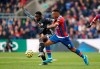 Leicester City's Wilfred Ndidi, left, and Crystal Palace's Jordan Ayew battle for the ball during the English Premier League soccer match at Selhurst Park, London, Sunday Nov. 3, 2019. (John Walton/PA via AP)