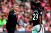 Manchester United manager Ole Gunnar Solskjaer, left, instructs Aaron Wan-Bissaka from the touchline during the English Premier League soccer match against Southampton at St Mary's, Southampton, England, Saturday Aug. 31, 2019. (Mark Kerton/PA via AP)