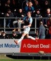 Burnley's Chris Wood celebrates scoring his side's first goal of the game against Tottenham Hotspur during their English Premier League soccer match at Turf Moor in Burnley, England, Saturday Feb. 23, 2019. (Martin Rickett/PA via AP)