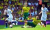 Chelsea's Christian Pulisic, left, and Norwich City's Marco Stiepermann battle for the ball during the English Premier League soccer match between Norwich City and Chelsea at the Carrow Road Stadium, Norwich, England. Saturday, Aug, 24 2019. (Joe Giddens/PA via AP)