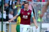 Burnley's Chris Wood celebrates scoring his side's first goal of the game during the English Premier League soccer match between Burnley and Norwich City at the Turf Moor Stadium, Burnley, England. Saturday, Sept. 21 2019. (Richard Sellers/PA via AP)