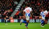 Bournemouth's David Brooks, left, scores his side's first goal of the game during the English Premier League soccer match between AFC Bournemouth and Brighton Hove Albion at the Vitality Stadium, Bournemouth, England. Saturday, Dec. 22, 2018. (Mark Kerton/PA via AP)