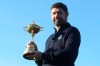 Padraig Harrington holds the Ryder Cup for the media at the Wentworth Golf Club, south England, Tuesday Jan. 8, 2019. Padraig Harrington has been chosen as captain of the Europe team for the 2020 Ryder Cup at Whistling Straits, it was announced by the European Tour at its headquarters at Wentworth. (Adam Davy/PA via AP)