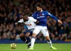 Tottenham Hotspur's Tanguy Ndombele, left, and Everton's Andre Gomes battle for the ball during the English Premier League soccer match at Goodison Park, Liverpool, England, Sunday Nov. 3, 2019. (Nick Potts/PA via AP)