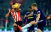Southampton's Charlie Austin, left, blocks a shot from Fulham's Tim Ream during their English Premier League soccer match at St Mary's Stadium in Southampton, England, Wednesday Feb. 27, 2019. (Mark Kerton/PA via AP)