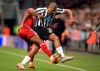 Fulham's Denis Odoi, left, and Newcastle United's Salomon Rondon battle for the ball during the English Premier League soccer match between Newcastle United and Fulham at St James' Park, Newcastle, England. Saturday, Dec. 22, 2018. (Owen Humphreys/PA via AP)