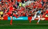 Wales' Daniel James scores against Slovakia during the Euro 2020 qualifying, Group E soccer match at the Cardiff City Stadium, Wales, Sunday March 24, 2019. (Darren Staples/PA via AP)