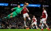 Arsenal goalkeeper Bernd Leno blocks a Manchester City shot, during their English Premier League soccer match at the Etihad Stadium in Manchester, England, Sunday Feb. 3, 2019. (Nick Potts/PA via AP)