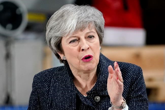 Britain's Prime Minister Theresa May gives a speech in Grimsby, north east England, Friday March 8, 2019. British lawmakers are due to vote for a second time Tuesday on the deal, which they overwhelmingly rejected in January. (Christopher Furlong/PA via AP)