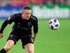 FILE - In this file photo dated Sunday, Aug. 12, 2018, D.C. United forward Wayne Rooney, in action against Orlando City during the second half of an MLS soccer match, in Washington, USA. It is announced Tuesday Aug. 6, 2019, that 33-year old former England captain Wayne Rooney will be leaving US Major League Soccer to join second-tier English Championship team Derby County as player-coach from January 2020. (AP Photo/Nick Wass, FILE)