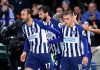 Brighton and Hove Albion's Glenn Murray, left, and Leandro Trossard celebrate Everton's Lucas Digne scoring an own goal during the English Premier League soccer match between Brighton and Hove Albion and Everton at the AMEX stadium, Brighton, England. Saturday, Oct. 26 2019 (Gareth Fuller/PA via AP)