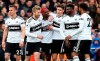 Fulham's Ryan Babel, center left, celebrates scoring his side's first goal of the game during the English Premier League soccer match between Fulham and Cardiff City at Craven Cottage stadium, London, England. Saturday, April 27, 2019. (Steven Paston/PA via AP)