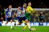 Brighton and Hove Albion's Neal Maupay, left, and Norwich City's Kenny McLean battle for the ball during the English Premiership League soccer match at The AMEX Stadium, Brighton, England, Saturday Nov. 2, 2019. (Gareth Fuller/PA via AP)