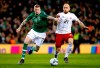 Republic of Ireland's James McClean, left, and Georgia's Valerian Gvilia in action during their UEFA Euro 2020 Qualifying, Group D soccer match at the Aviva Stadium in Dublin, Ireland, Tuesday March 26, 2019. (Niall Carson/PA via AP)