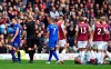 Referee Graham Scott gives Everton's Seamus Coleman, left, a red card during the English Premier League soccer match against Burnley at Turf Moor, Burnley, England, Saturday Oct. 5, 2019. (Anthony Devlin/PA via AP)