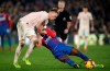 Crystal Palace's Wilfried Zaha, right, reacts to a challenge from Manchester United's Scott McTominay, during their English Premier League soccer match at Selhurst Park in London, Wednesday Feb. 27, 2019. (John Walton/PA via AP)