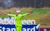 South Korea's Mi Jung Hur celebrates holing her birdie putt to win the Ladies Scottish Open at The Renaissance Club in North Berwick, Scotland, Sunday Aug. 11, 2019. (Kenny Smith/PA via AP)