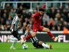 Liverpool's Mohamed Salah jumos over a challenge from Newcastle United's Isaac Hayden during the English Premier League soccer match at St James' Park, Newcastle, England, Saturday May 4, 2019. (Owen Humphreys/PA via AP)