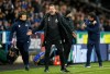 Huddersfield Town manager Jan Siewert reacts on the touchline during the game against Everton during their English Premier League soccer match at the John Smith's Stadium in Huddersfield, England, Tuesday Jan. 29, 2019. (Nigel French/PA via AP)